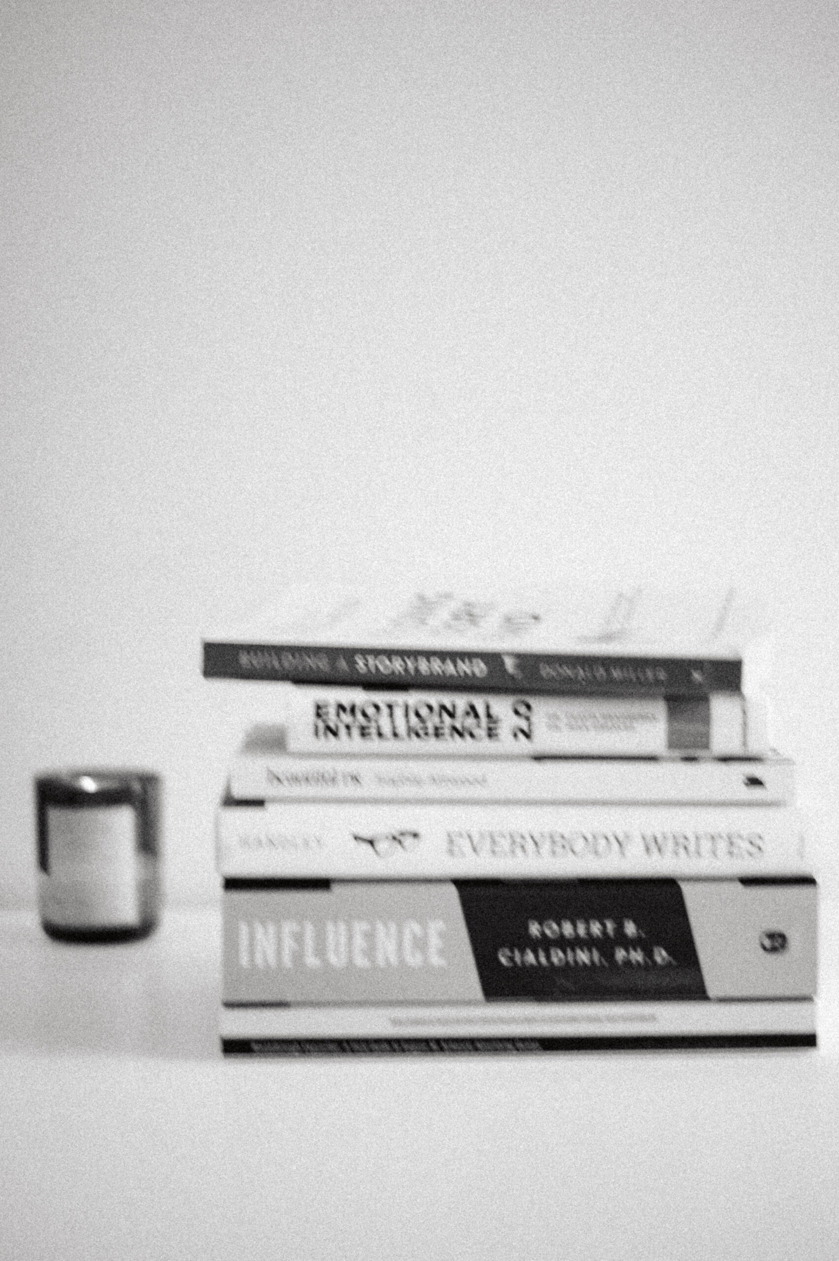 A stack of copywriting books at The Copy Therapist Studio,